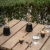 2 Humble One Table Light IP65/Outdoor on a table outdoors